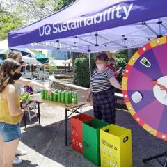 Image of UQ students having a go at the Recycling Game