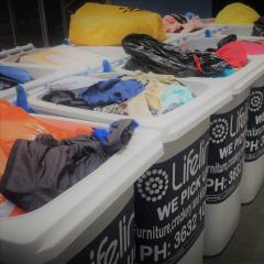 Lifeline bins full of donated items 